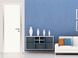 Door frame with architraves for hinged door